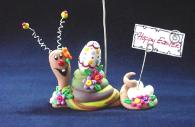 Easter Snail Photo Holder-Handmade with glazed Fimo. Nickel and silver wire are used for final details. Each Item can be personalized or the note can bring a special message. (Please, specify it with your order) 