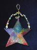 Christmas 'Artistic Star' Ornament- This porcelain handmade ornament is painted in bright colors and black enamel details. Glass  beads and gold color wire are used for final and hanging details. Very different!