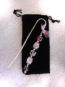  Cancer Awareness Bookmark- Handcrafted with a twisted metal bookmark, glass and silver beads and spacers. Pink organza ribbon. Because we have hope! Each bookmark comes in a suede black bag for protection and presentation. Just beautiful and tender!