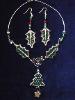 Christmas Leaves Necklace & Earrings Set- This porcelain handmade necklace is painted in glossy  green and gold enamel details.  Also,  some foil effects are applied. Austrian Crystals, glass beads and gold plated beads are used for final touches. Gold plated wire is used for final details. Earrings, are one set of two Leaves design.