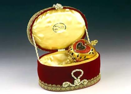 Each Eggypiece Box is decorated and carefully crafted by the artist thinking about providing these pieces of art with proper storage, comfort and protection. Each box completes the eggypiece by selecting coordinating fabrics and details to combine with the art piece. Boxes are covered w/velvet fabric and decorated with gold satin details. The inside is protected w/foam and covered w/satin fabric. Color and size will depend on the Eggypiece. Fabric color can be selected by customer.