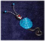Lt Blue Snail Pin- Handmade with glazed Fimo. Nickel and silver wire are used for final details. Pins are embellished with Austrian crystals.