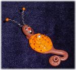 Orange Snail Pin- Handmade with glazed Fimo. Nickel and silver wire are used for final details. Pins are embellished with Austrian crystals.
