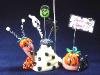 Halloween Snail Photo or Note Holder, handmade crafts-Handmade with glazed Fimo. Nickel and silver wire are used for final details. Each Item can be personalized or the note can bring a special message. (Please, specify it with your order)