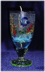 Large Gel Candle- Lt. Blue glass goblets. Gel wax and glass fish are used to embellish the gel candle. Dry flowers sticks are used to create the coral atmosphere. Zinc-cored wick for great and secure burning process. Unique designs!  All fragrances available! Specify the fragrance with your order. Thank you.