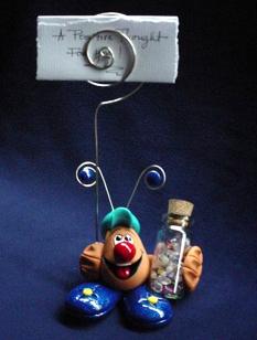  Handmade with Fimo. Glass bottle full of polished Quartz pieces. A positive message card is included!