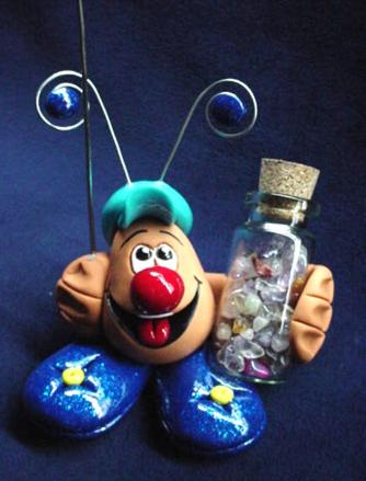  Handmade with Fimo. Glass bottle full of polished Quartz pieces. A positive message card is included!