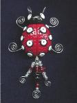 Fimo Red Lady Bug Pin- Handmade with glazed Fimo. Silver plated  wire and glass beads are used for final details. 