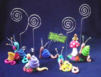 Gang of 5 Snail Photo or Note Holder-Handmade with glazed Fimo. Nickel and silver wire are used for final details. Beautiful to start a new collection line. 