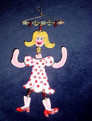 This porcelain handmade ornament is painted in translucent colors. Also, black, mother of pearl and white colors are used for final details. A unique design handmade hanger w/metal and glass beads are used to embellish the porcelain creation. Unique design, one-of-a-kind ! 100% handmade 