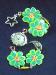 Fimo Green Flower Watch-  Handmade with glazed Fimo. Silver plated  wire, findings and clasps are used for final details. Glass beads are used to embellish the Fimo Green Flowers.