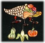 Thanksgiving Cornucopia Pin- This porcelain handmade pin is hand painted in glossy bright colors. Glass beads and wire are used for the final details.   Unique Design!