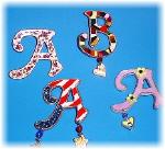 Display of different designs available.  Collect all 26 letters of the alphabet!